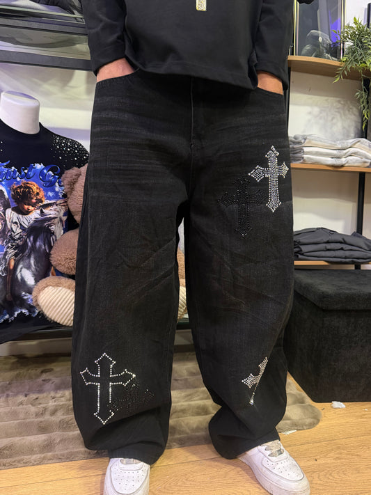 Jeans nero con applicazione croce strass